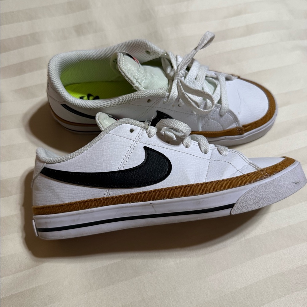 Nike White Sneakers with Gold Detail